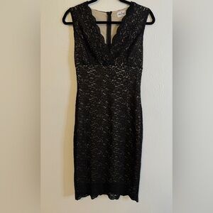 “Black Lace Sleeveless Dress with V-Neckline”